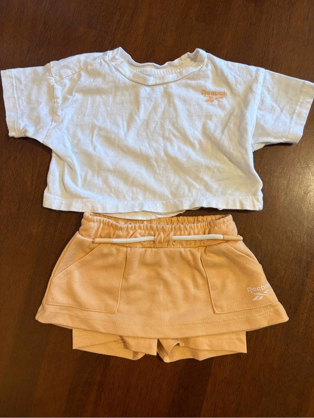 Reebok White Cropped Tee with Peach Skort Set